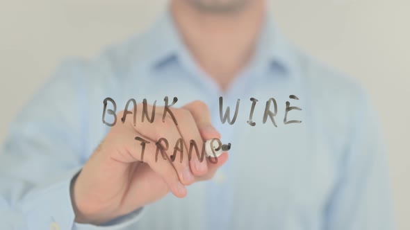 Bank Wire Transfer, Man Writing on Transparent Screen