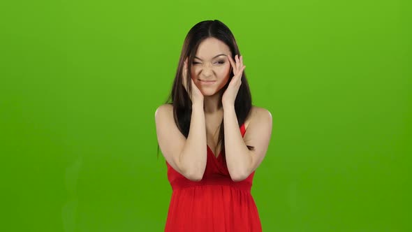Girl Has a Headache, She Is Suffering From Migraines. Green Screen