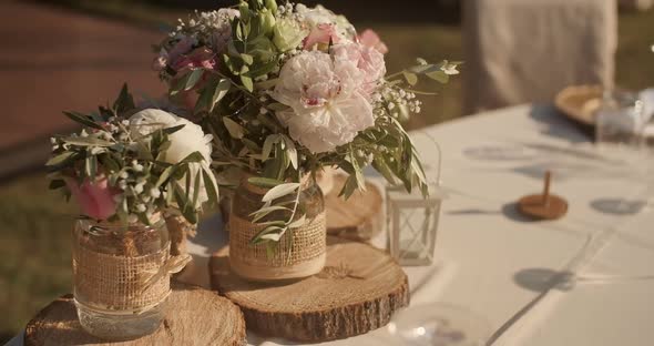 Party table with drinks and sweets . Wedding decor at an exit ceremony