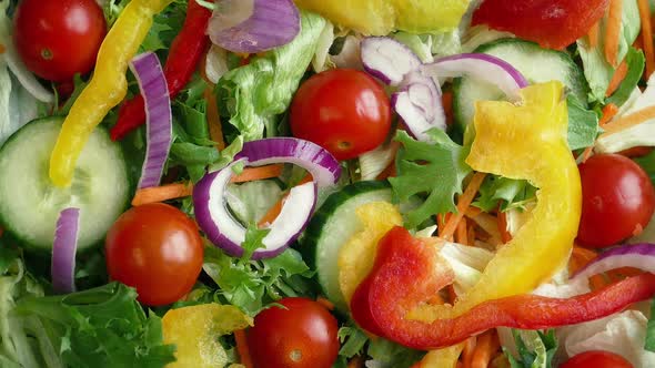 Overhead Shot Of Fresh Mixed Salad Rotating