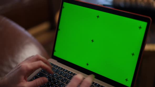 Closeup Chromakey Laptop with Male Hands Typing on Keyboard