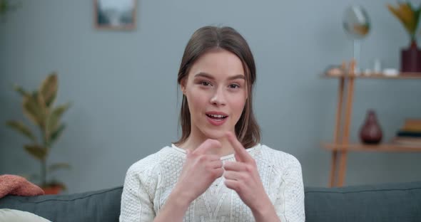 Close Up View of Young Woman Showing with Deaf-mute Sign Language I Love Life. Pretty Female Person