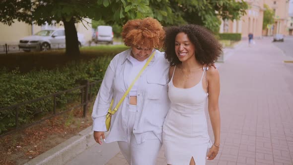 Lovely Beautiful Happy Lesbian African American Couple Walking Hugging Around City Street Landscape