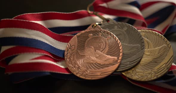 Close Up of Track Medals on a Table