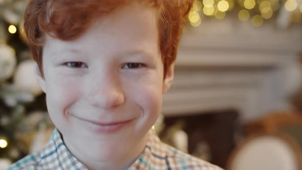 Portrait of Joyous Kid on Christmas at Home