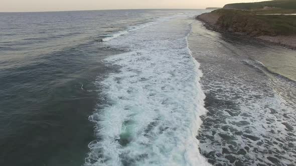 Drone View of the Sea Coast with Rocky Shore and Waves