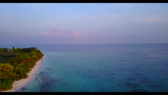 Aerial drone view seascape of idyllic coastline beach lifestyle by transparent lagoon with white san