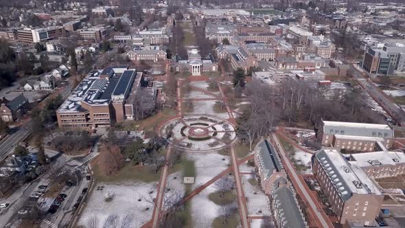 University of Delaware college campus quad with snow in winter aerial