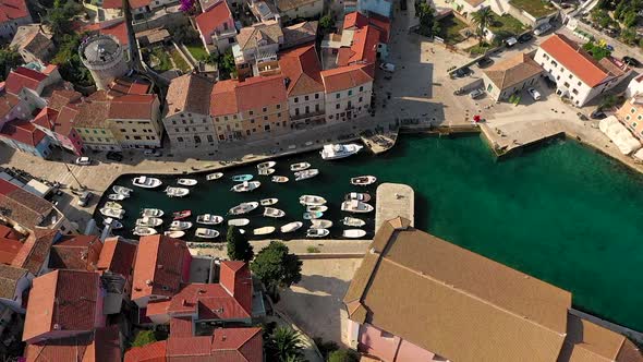 Aerial view above of Veli Losinj old town during the day, Croatia.