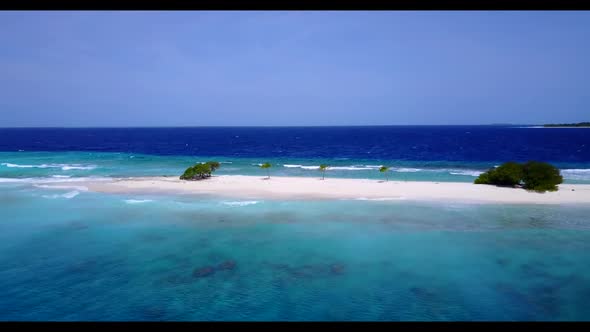 Aerial view sky of tropical seashore beach break by blue lagoon and white sandy background of advent