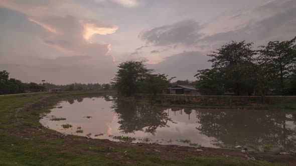 Timelapse sunrise an rural scenic view of a little village