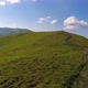 Aerial flight over green hill mountains. FPV Dynamic drone shot - VideoHive Item for Sale