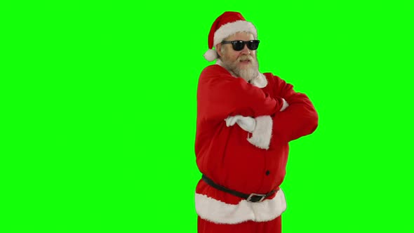 Santa claus posing with sunglasses