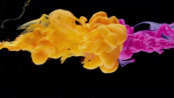 Pink and yellow ink in the water