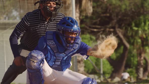 Baseball player catching a ball during a match