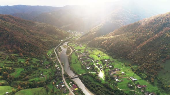 River with Bridge Connects Villages Between Forestry Hills