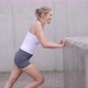 Slim Woman Stretching on Street - VideoHive Item for Sale