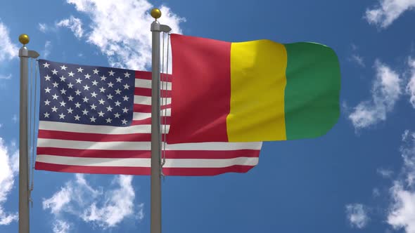 Usa Flag Vs Guinea Flag On Flagpole