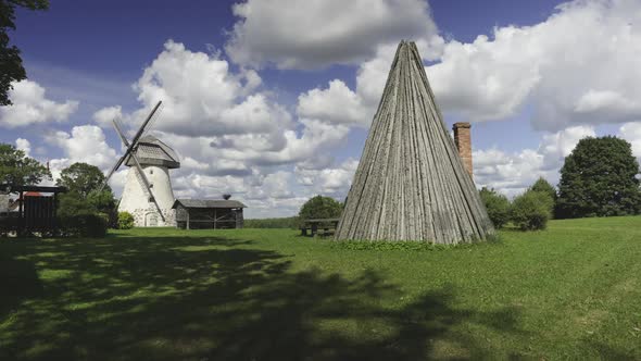 Old mill on a hill in Latvia in summer