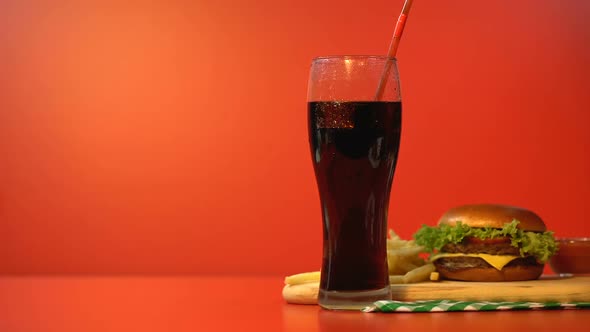 Person Drinking Soda With Straw, Fast Food Lunch, Unhealthy High Calorie Meal