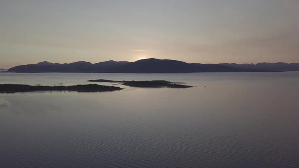 Midnight Sun in Napp, Lofoton Islands, Norway Aerial Drone 4K