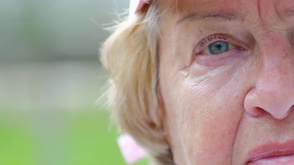 Close Up of Upset Grandmother Face She is Looking at Camera