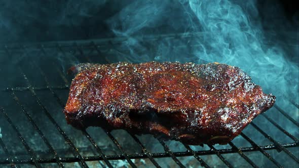 Grilling BBQ Ribs in ultra slow motion 1500fps on a Wood Smoked Grill - BBQ PHANTOM 023