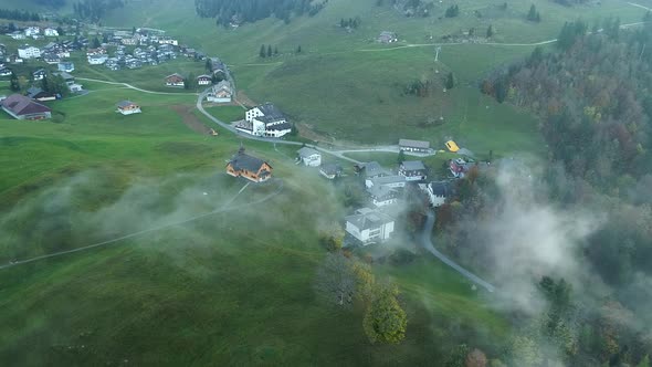 Timelapse aerial video of clouds moving over the village of Stoss, Switzerland (1)