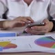 Businesswoman Is Working With Mobile Phone And Stock Chart. Business Economic Concept - VideoHive Item for Sale