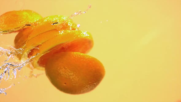 Sliced orange in water, Slow Motion