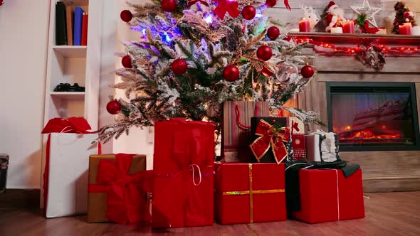 Gift Boxes Under Christmas Tree Beautifuly Decorated