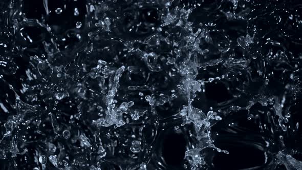 Super Slow Motion Shot of Splashing Water on Black Background at 1000Fps.