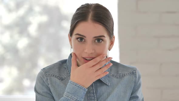 Portrait of Young Girl Wondering in Shock