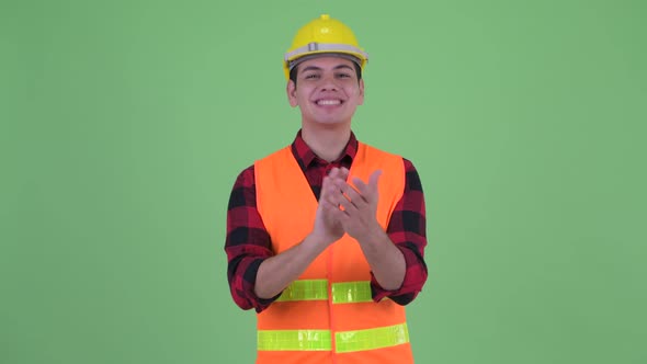 Happy Young Multi Ethnic Man Construction Worker Clapping Hands
