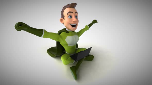 Fun 3D cartoon superhero typing on a laptop