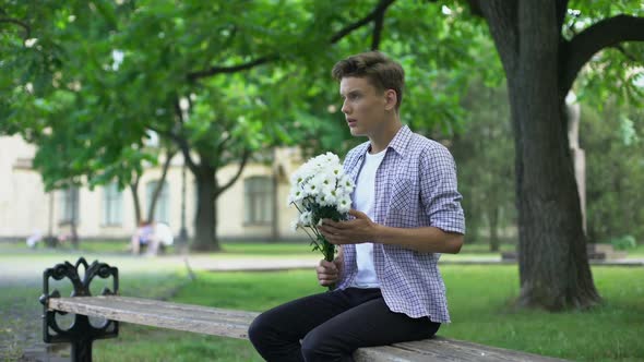 Anxious Boyfriend Waiting for Girlfriend in Park, Blind Date, Lady Being Late