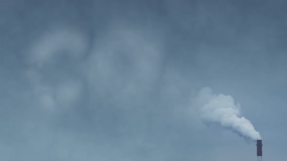 Factory Chimney Smokes on the Industrial Background and CO2 Sign in Smoke Cloud