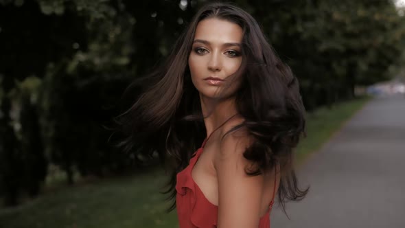 Fashion Woman Portrait in Red Dress.