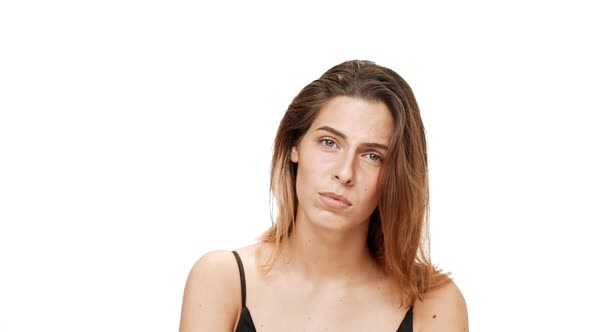 Upset Young Beautiful Girl Thinking Listening Over White Background