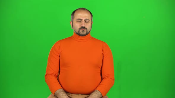 Caucasian Man Thinks Hard Next an Idea Comes To Him. Green Screen