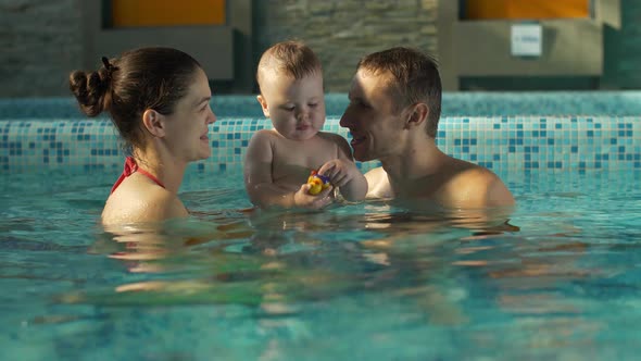 Happy Family in the Pool