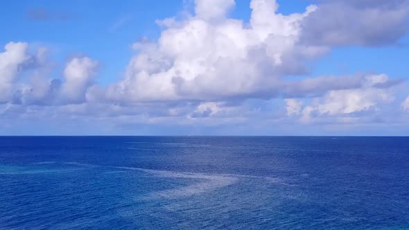 Aerial sky of tropical resort beach by blue ocean with sand background