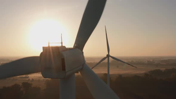 Wind Turbine Farm with Beautiful Landscape at Sunrise