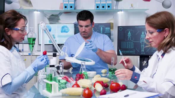 Zoom in Slow Motion Footage of Busy Food Genetics Research Laboratory alt