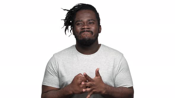 Portrait of Thoughtful Dark Skinned Guy with Afro Pigtails Thinking About Choice or Decision While