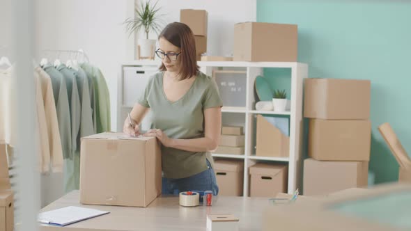 Shop Assistant Subscribing Parcel