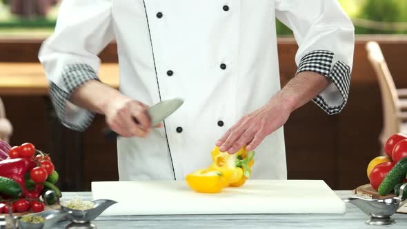 Chef Cutting a Vegetable.