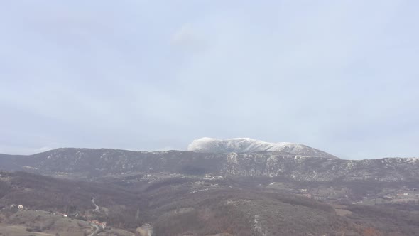 Top of Stol as part of Carpathian mountains ranges by winter 4K drone video