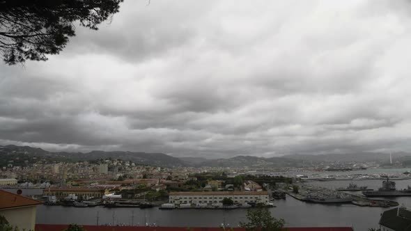 View from Top on Beautiful Pisa City, Port with Ships and River Arno in Italy