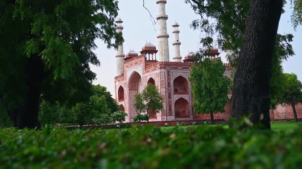 Facade Of Akbar's Tomb The Great With Foliage Landscape In Sikandra A Sub Of Agra Uttar Pradesh